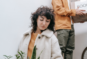 Woman reading a document handed to her