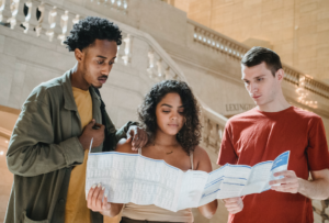 Students looking at a map together
